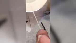 taking a lengthy urinate with a schlong