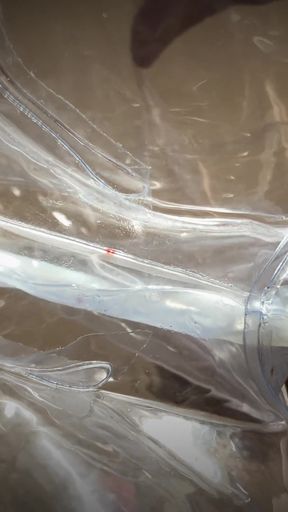 Spectacular moment from "Man moaning and pulsating creampies a transparent lovedoll - watch the cock throb and the cum drip"