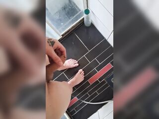 Pissing into the shower with pressure