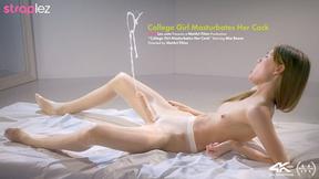 ”Charming dorm chick jerks her strapless prick until it squirts”