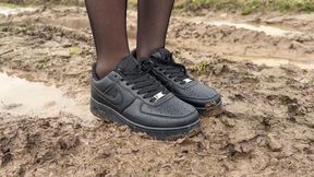 Nike sneakers getting stuck in mud, muddy sneakes, wrecked sneakers, nike sneakers sinking in deep mud