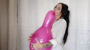 Blowing up and squeezing a pink balloon with my nails. Balloon B2P - Mishel Looner balloons