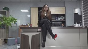 Li Yu black nylon socks and full office attire. She looks very sharp