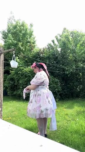 In outfit with a little babydoll dress to hang the laundry.