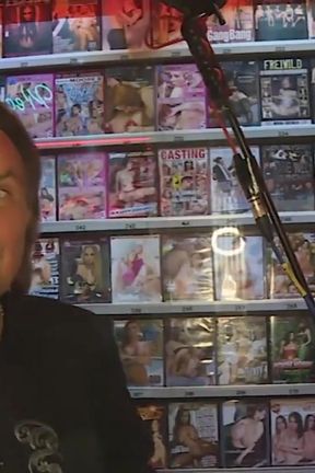Amateur Brunette Gets a Blowjob to a Guy in the Sexy Shop