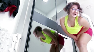 Woman finds unexpected release while touching herself in a dressing room