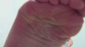 The giantess LORY tramples your body with her bare feet