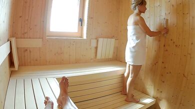 Blonde milf squirted after catching him jerking off in the sauna