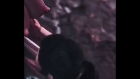 BUSTY BRUNETTE ON HER KNEES SUCKING DEMON DICK