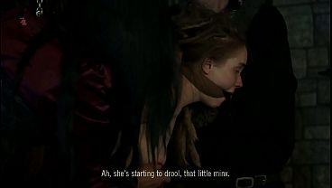 A vile witch girl is tied up and made to spit and drool by using a feather and with spanking (preview)