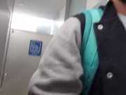 Jacking off and cumming with my pants down to my ankles at the Chicago airport bathroom