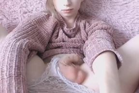 Innocent looking blonde tgirl plays her cock