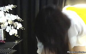 Busty Asian trans shows ass in thong on webcam