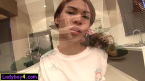 Asian ladyboy teen Kitty in a football uniform anal stuffed