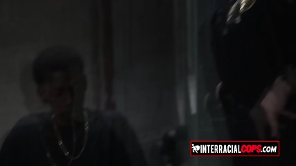 A police operation in the hood turns into a threesome scene with a black dude with massive cock.