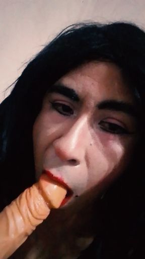 Trans babe sucking a rich dildo super big and fat