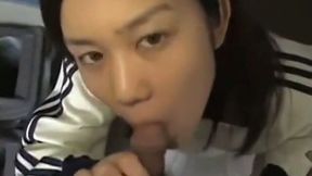 Cute Japanese coed girl enjoys sucking hot tasty dick on cam