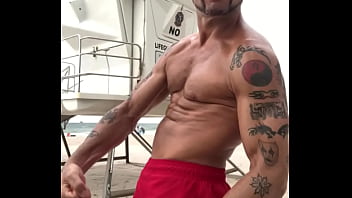 FLEXING AT BEACH