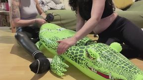 Trampling and riding on croc