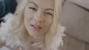 Blonde MILF in stockings gives sultry foot job