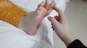 First-person Perspective Records the Girlfriend Wrapped in Tape From Head to Toe with Her Beautiful Bare Feet