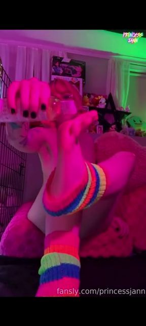 Rainbow-colored socks in a nightclub