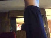 Young stud lifting weights and stripping