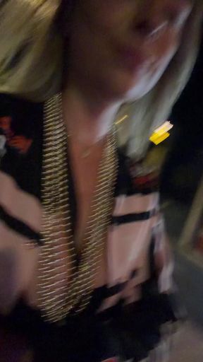Flirty girl shows off erect nipples with a nip slip