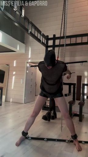 Domina dominates in goth bondage pegging scene