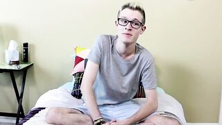 Casting twink jerks his enormous cock while spreading and rubbing his ass