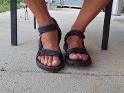 My male pedicured feet in sandals