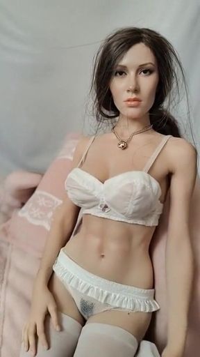 Cynthia Undresses on Bed