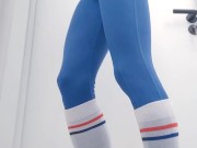 Slender trap teasing in tight one-piece yoga bodysuit and white socks
