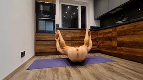 Muscular guy doing naked sexy yoga