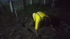 Latex Biohazard Drone Plays in Mud Pit