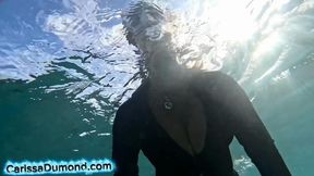 Carissa in her Hawaiian dive suit shortie in the ocean