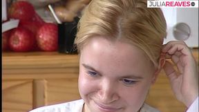 Shy blonde looks down while chatting with lover