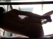 backlit creature and her pastel dildo
