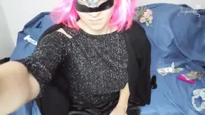 Voluptuous beauty wanks herself with a toy behind a pussy mask