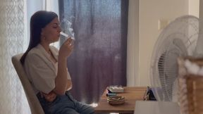 LOVE LOOKS SEXY IN PANTS AND SHIRT COMBINATION AND LIGHTS HER CIGARETTE