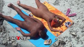 beach voyeur. naked teen blonde soaks up the sun with her wealthy old man.