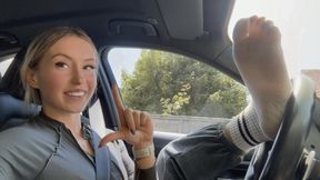 Foot ignore in gym socks in car