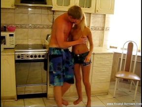 Blonde teen gets pussy drilled deeply in the kitchen