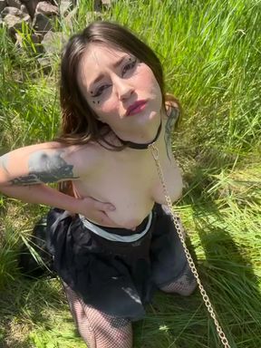 Busty babe in a collar plays with her big boobs
