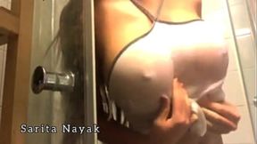 Sultry Sarita Nayak goes solo and dirty in the bath time ritual.