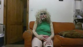 Trashed tranny slut Sarah Millward, fake tits flattened after night as a steetcorner whore, degrades heself further, drinking own piss and wanking