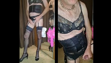 Crossdresser wearing black corset