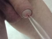 Happy New year! Closeup pissing uncutted dick