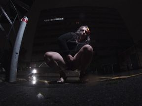 Mature sissy CD out in the rain in A parking lot in public masturbation.