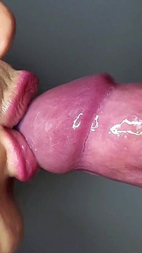 Close-up of a wet blowjob with a condom. Beautiful lips warm my cock   Clip 1